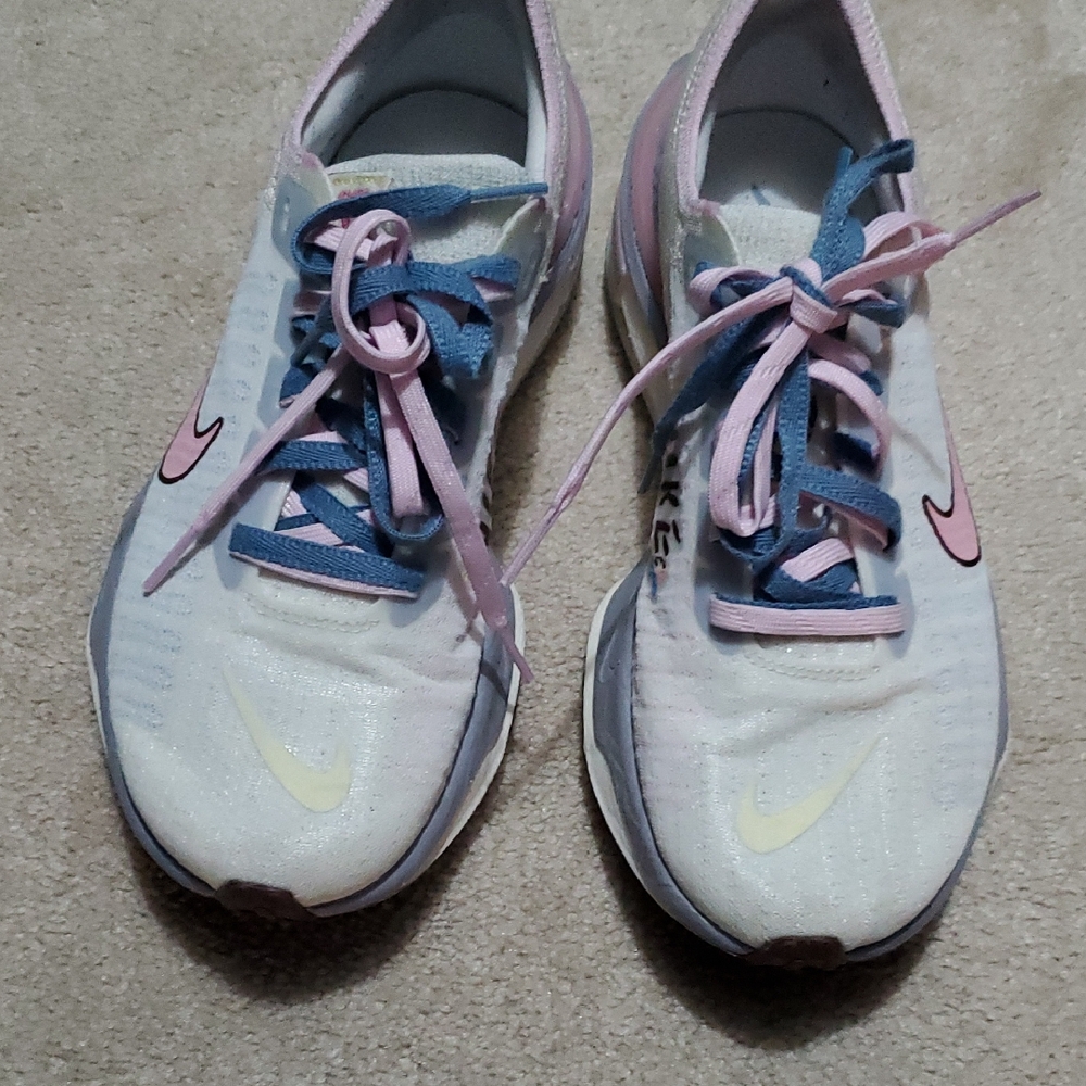 Nike Women's White and Blue Sneakers with Pink Accents